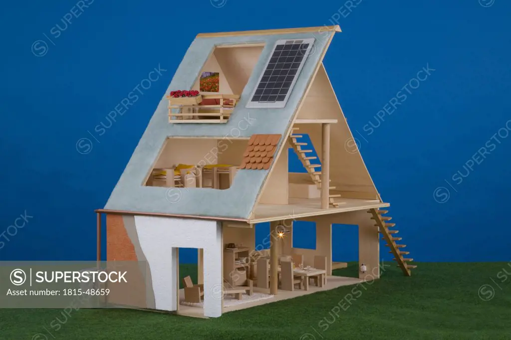 Dolls' house with solar cells on roof