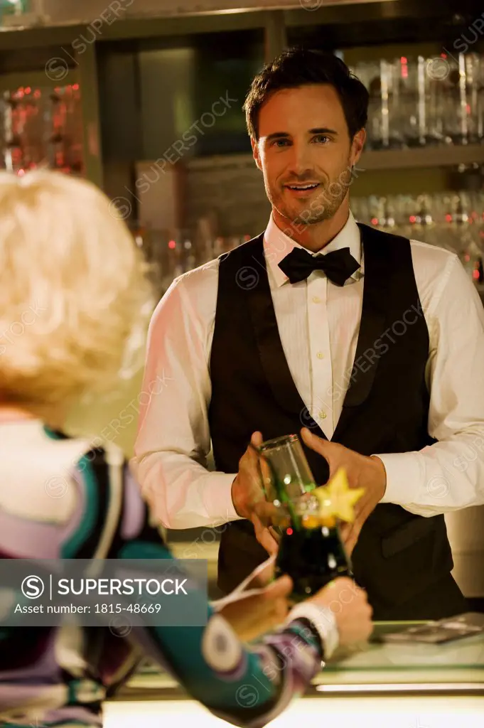 Barkeeper mixing a drink