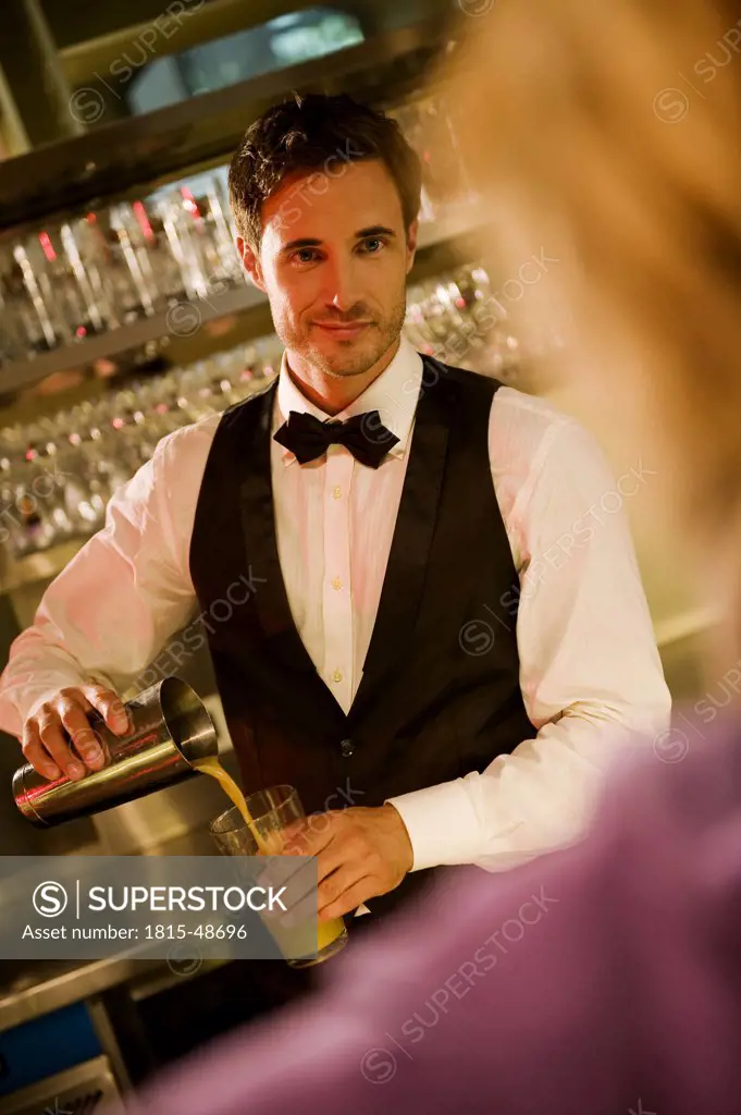 Barkeeper preparing a cocktail