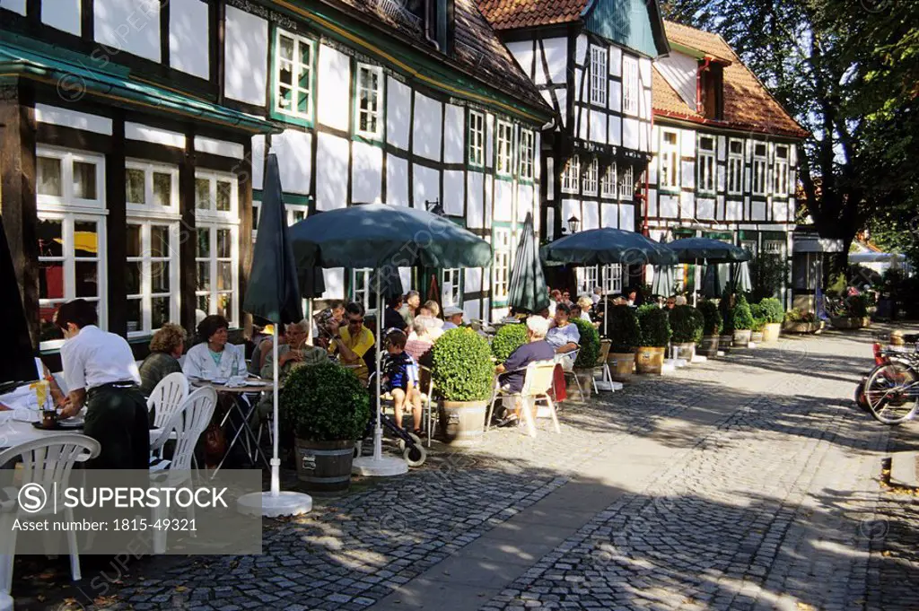 Germany, Bad Essen, Tourists in a sidewalk restaurant