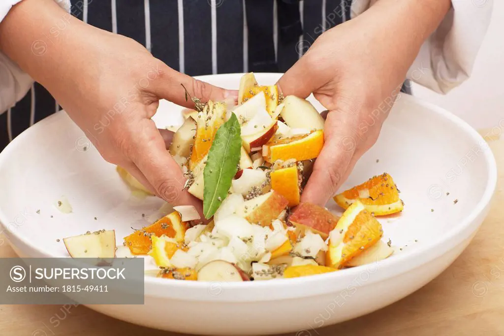 Person mixing the stuffing, close_up