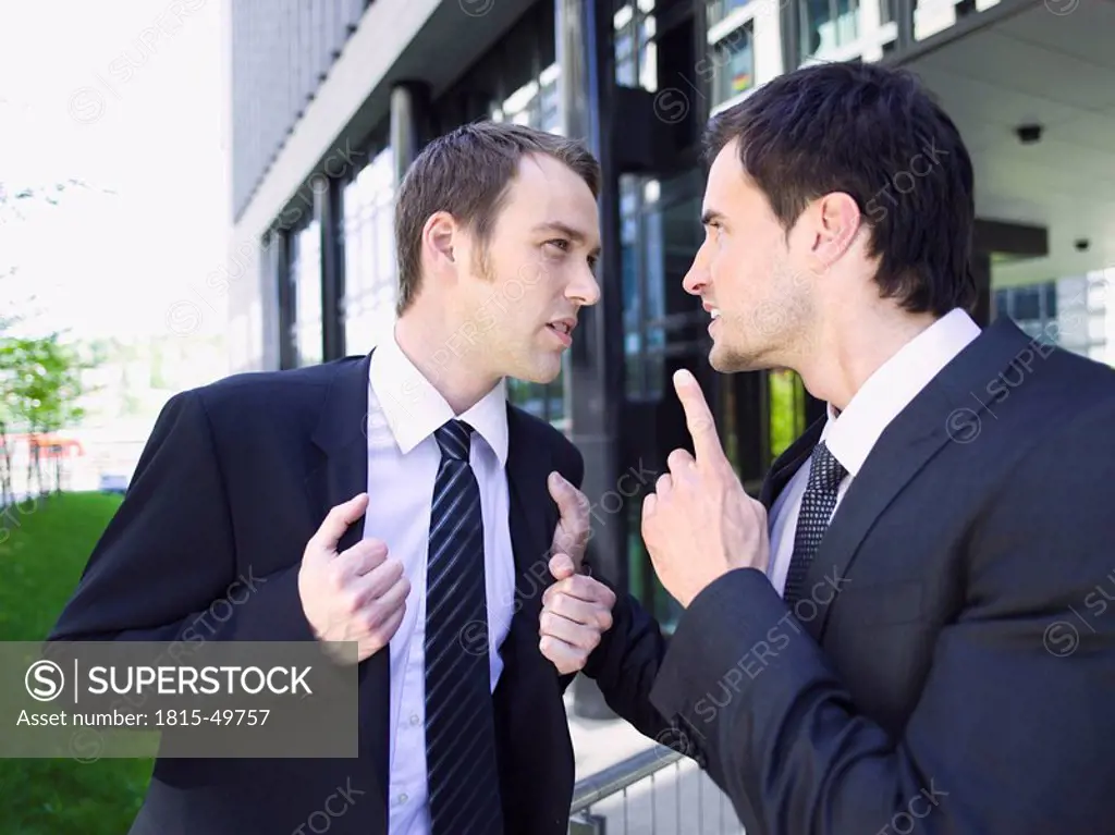 Germany, Baden_Württemberg, Stuttgart, Two businessmen arguing