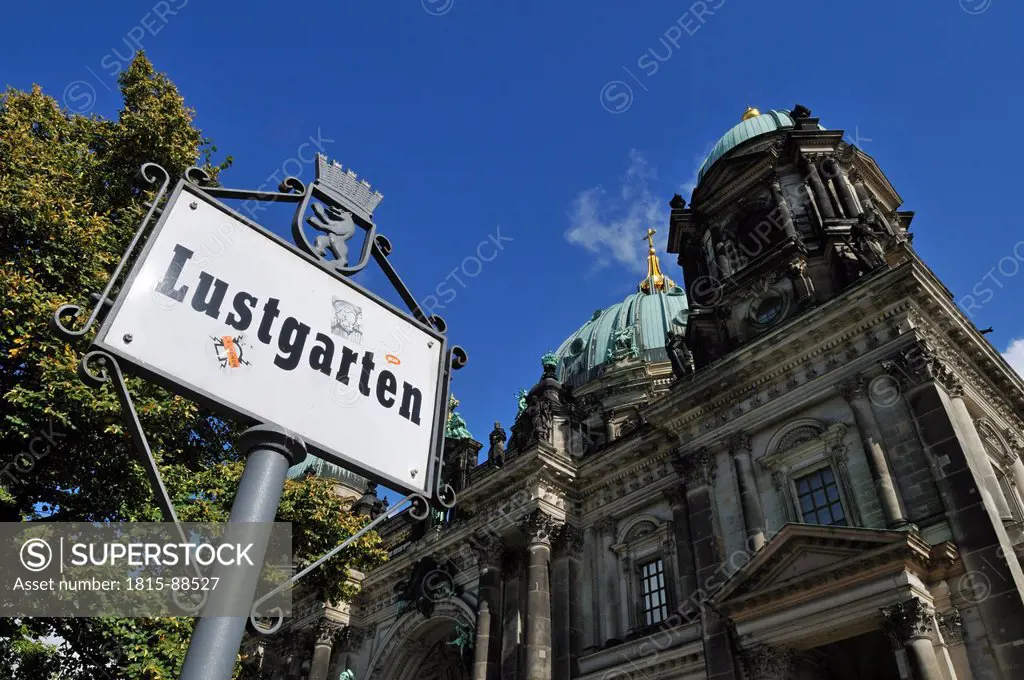 Europe, Germany, Berlin, View of Berlin Dom with Lustgarten place sign