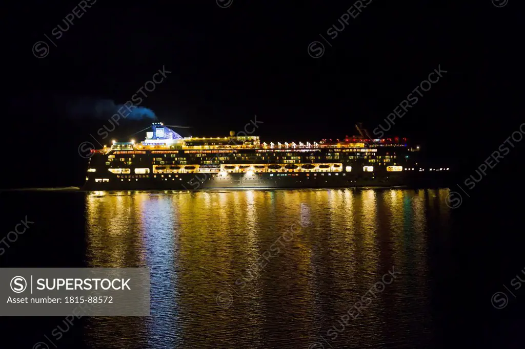 Europe, Greece, Thira, Cyclades, Santorini, Cruise liner in aegean sea at night