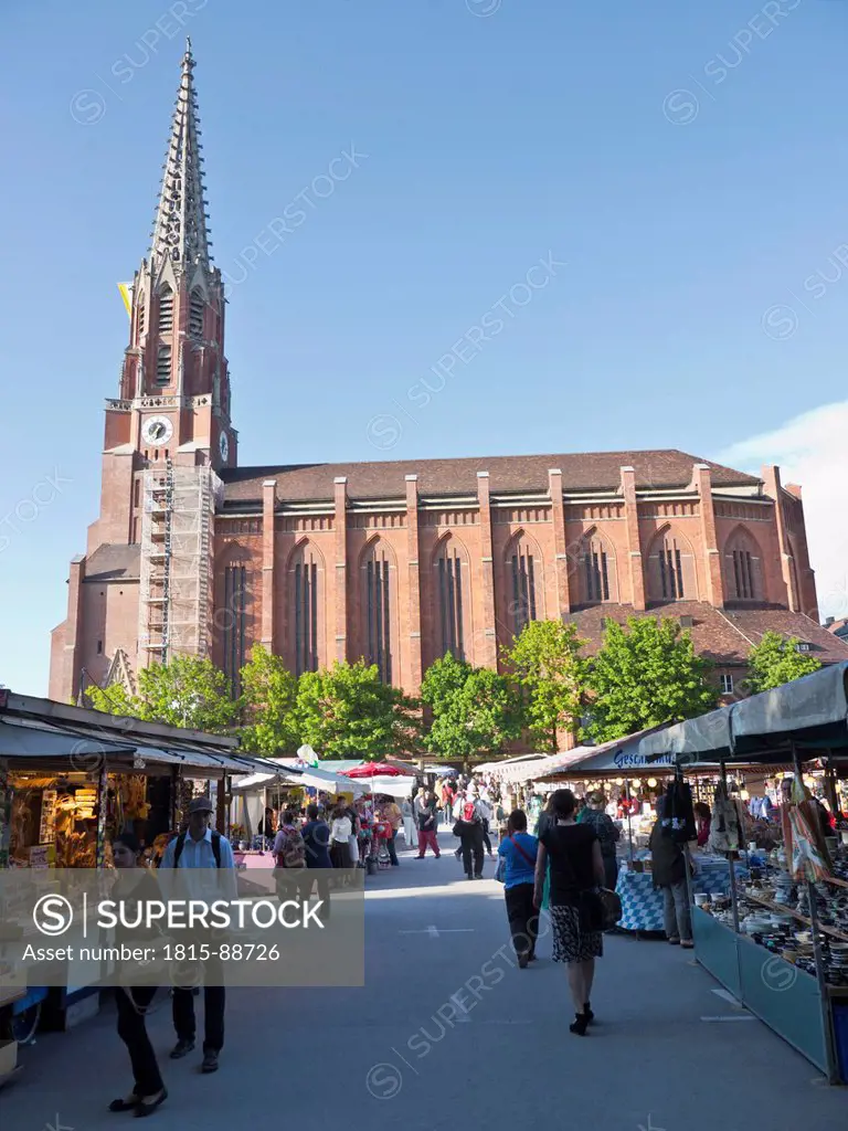 Germany, Bavaria, Munich, Auer Dult, View of annual market fair with Maria Hilf church in background