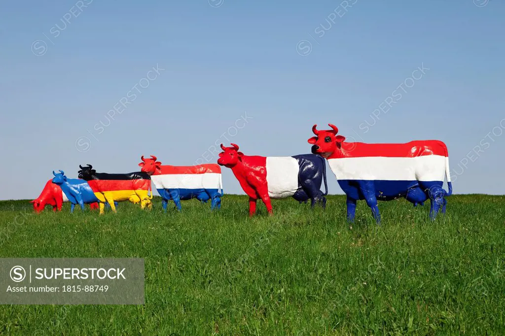 Austria, Lower Austria, Oed_Öhling, View of cow sculpture painted with national flag