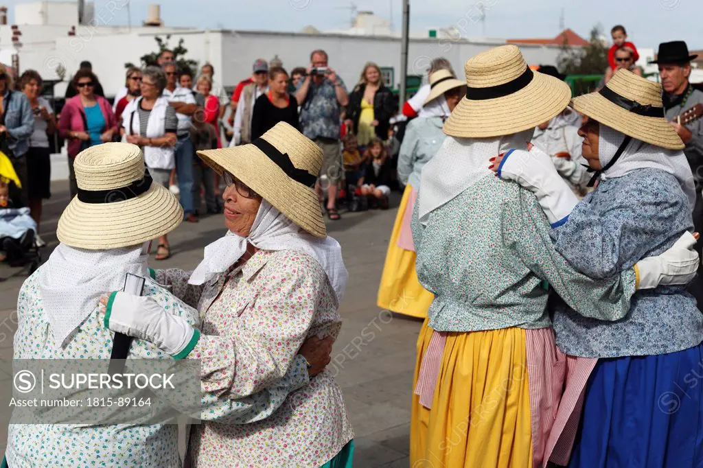 Spain, Canary Islands, Lanzarote, Traditional folk group at the market of Teguise