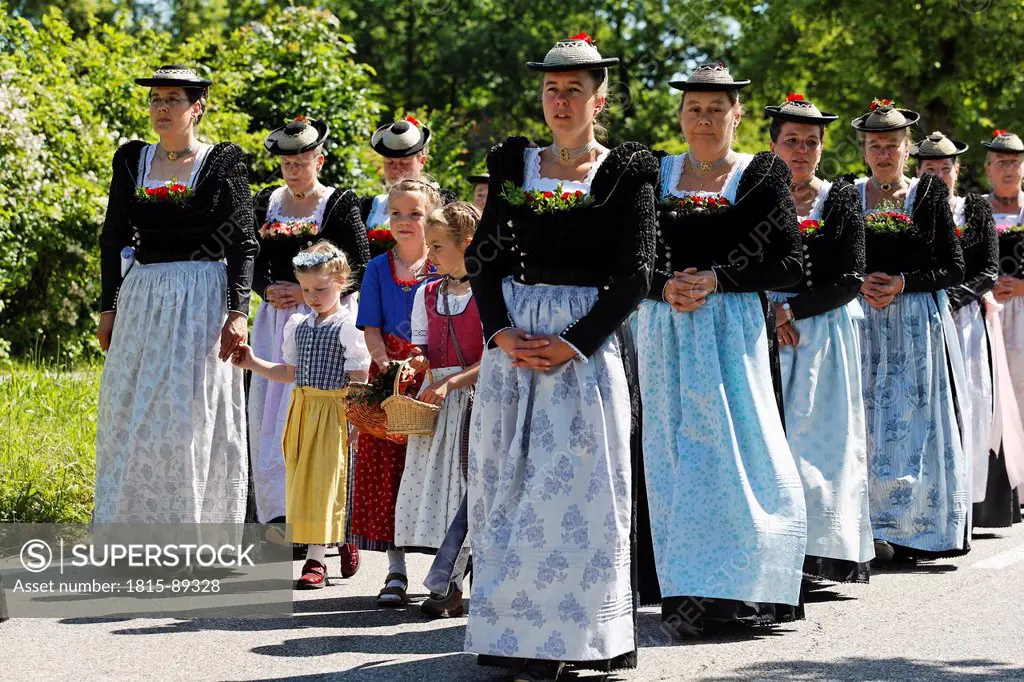 Germany, Upper Bavaria, Gmund am Tegernsee, Women and girls at feast of Corpus Christi procession