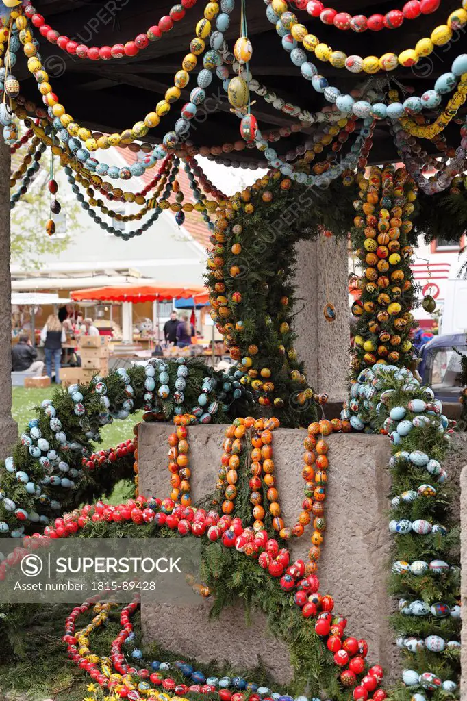 Germany, Bavaria, Franconia, Franconian Switzerland, Hollfeld, View of decorated easter well