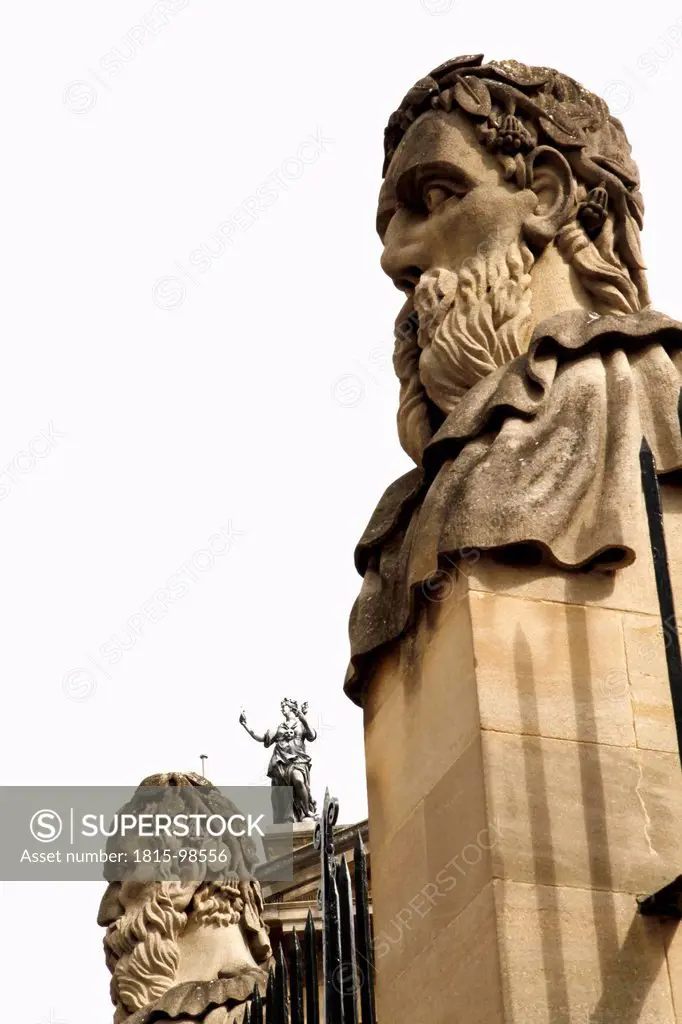 UK, England, Oxford, Statue head on fence of Bodleian Library
