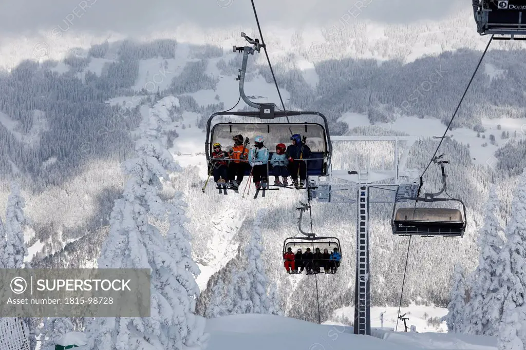 Austria, Styria, Schladminger Tauern, People in chair lift