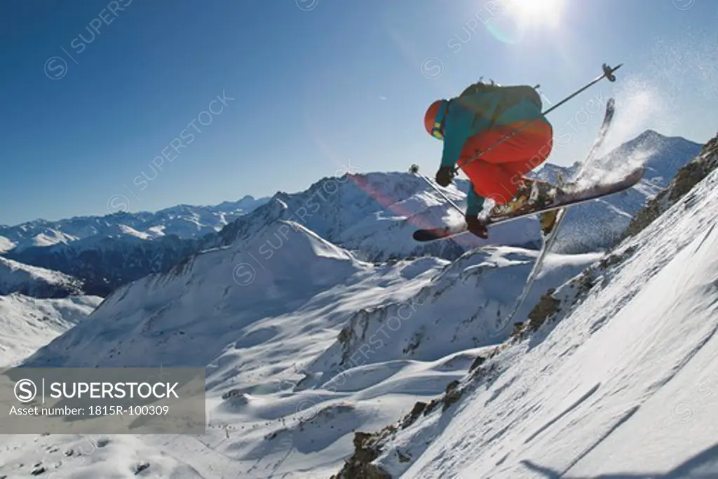 Austria, Tyrol, Ischgl, Mid adult man skiing