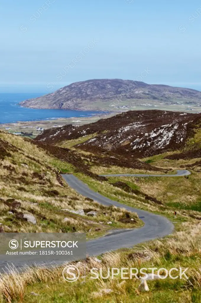 Ireland, County Donegal, View of road through hills