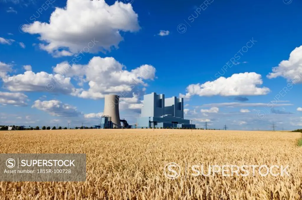 Europe, Germany, North Rhine Westphalia, View of coal power plant with corn field