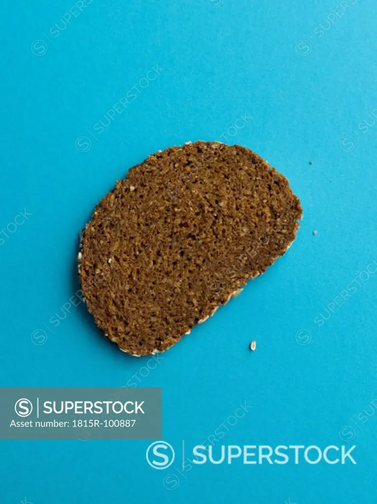 Brown bread on blue background