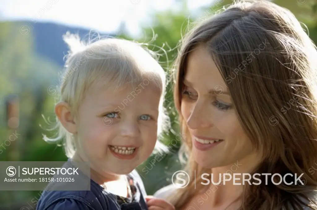 Germany, Bavaria, Mother and daughter smiling