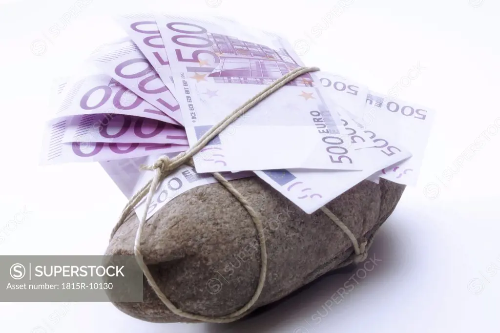 Fivehundred euro notes tied to stone