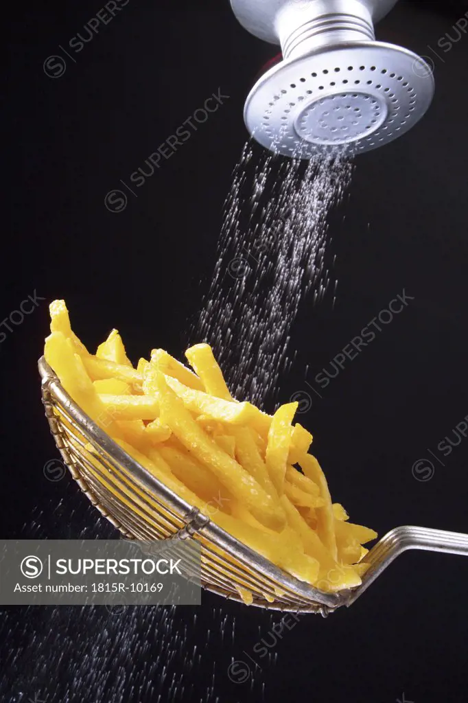 salted chips, black background, cut-out