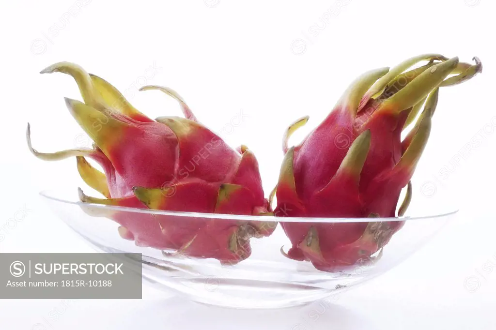 two Vietnam dragon fruits, cut-out, white background