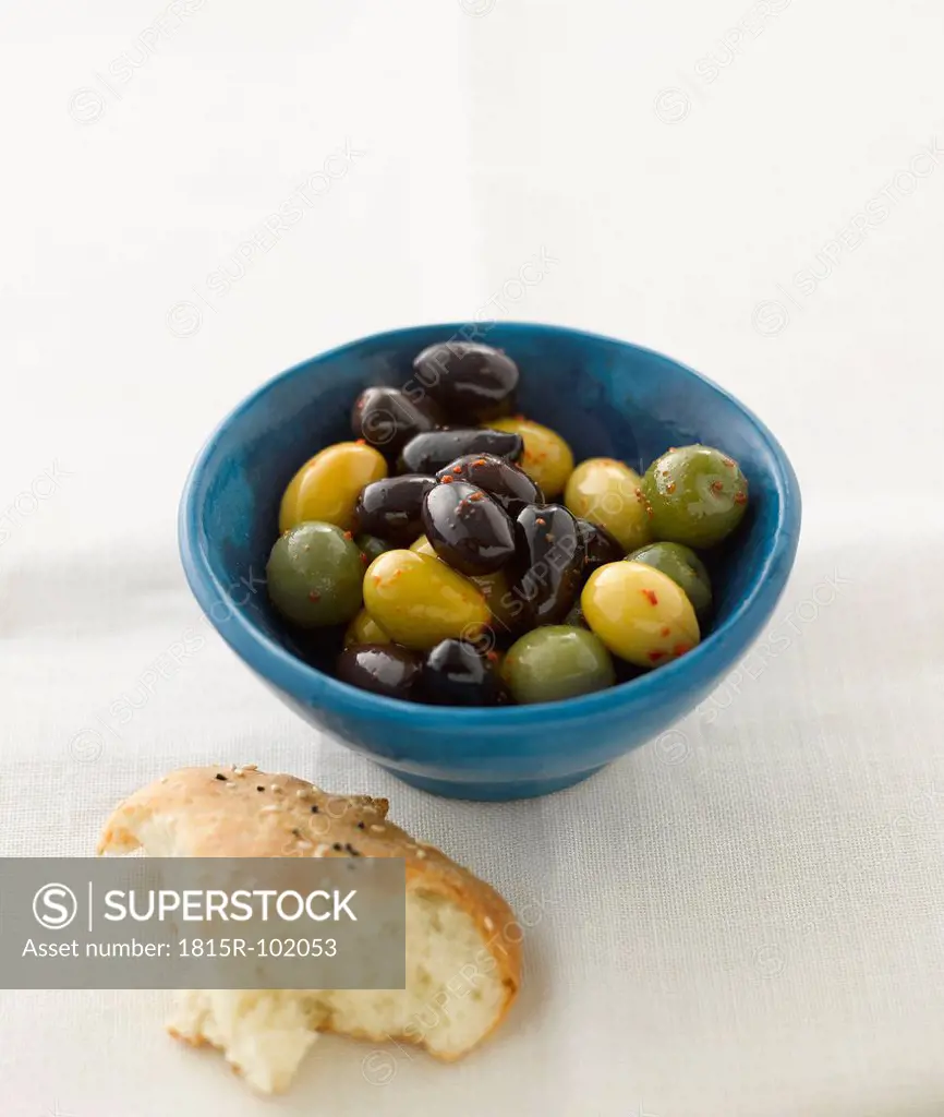 Mixed olives with pitta bread, close up