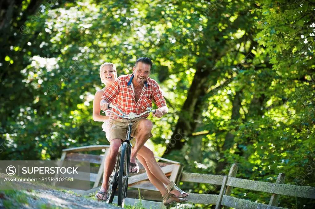 Austria, Salzburg County, Couple riding bicycle