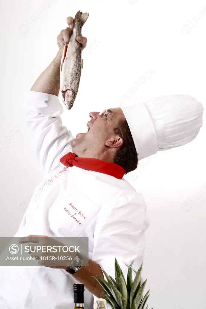 Chef holding trout