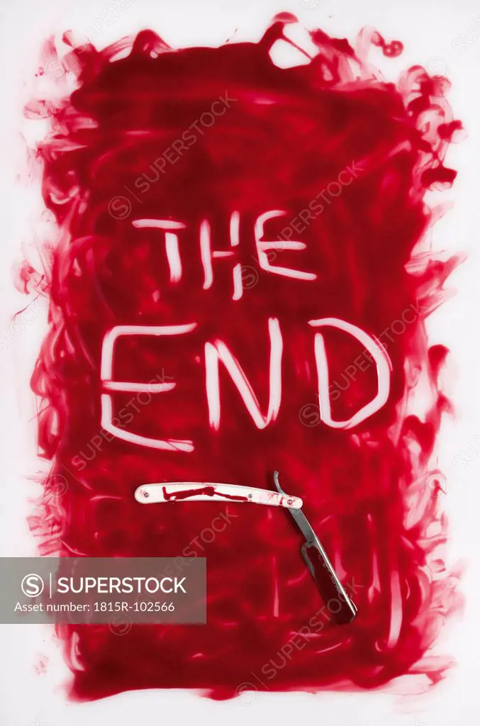 The end text written in blood with razor on white background