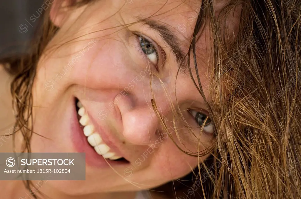 Greece, Mid adult woman smiling, portrait