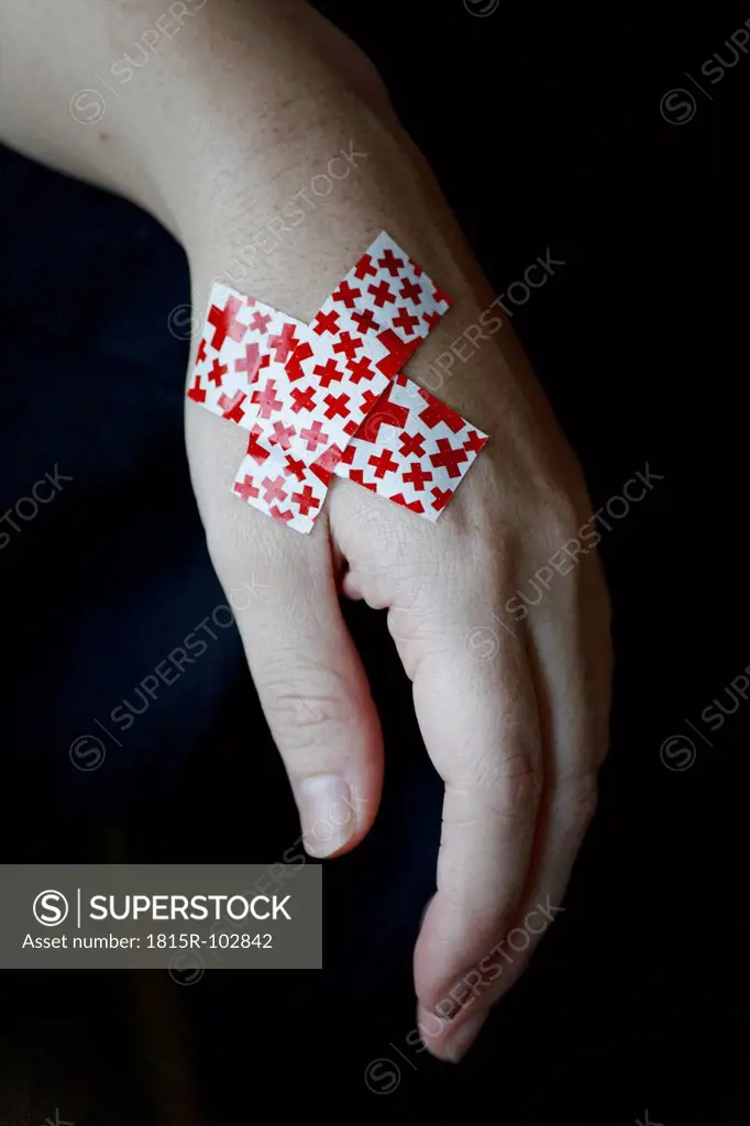 Young woman hand with bandage