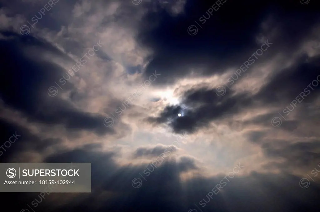 Germany, View of storm clouds and sun