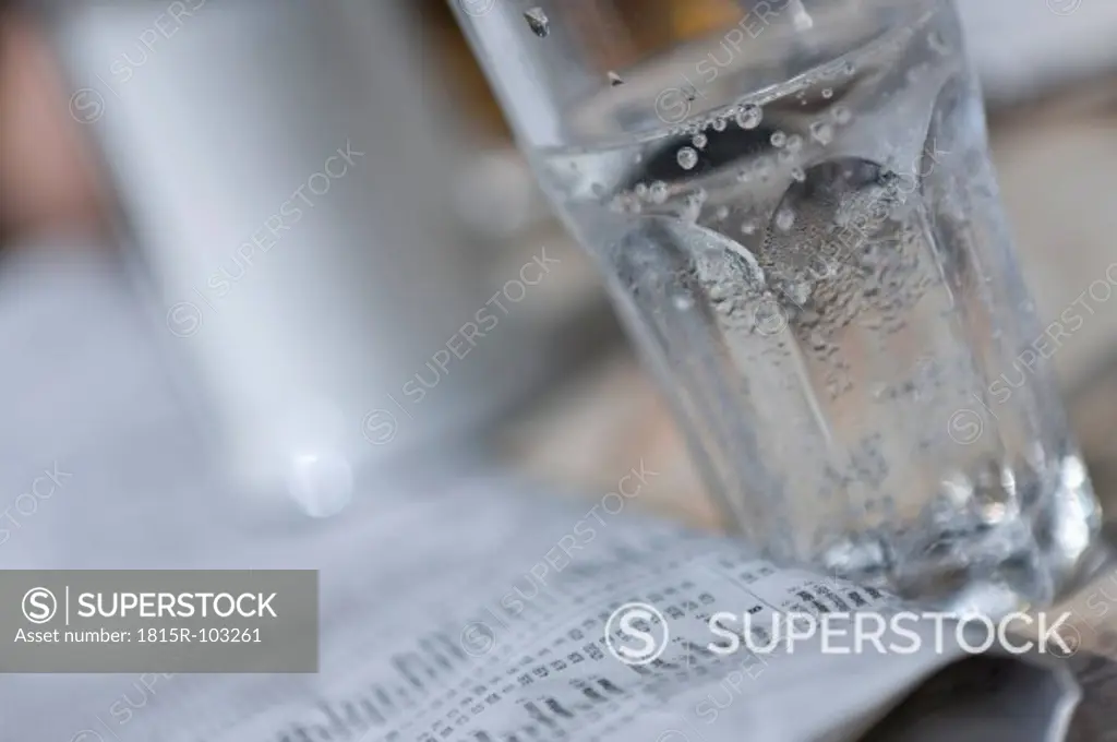 Glass with sparkling mineral water, close up