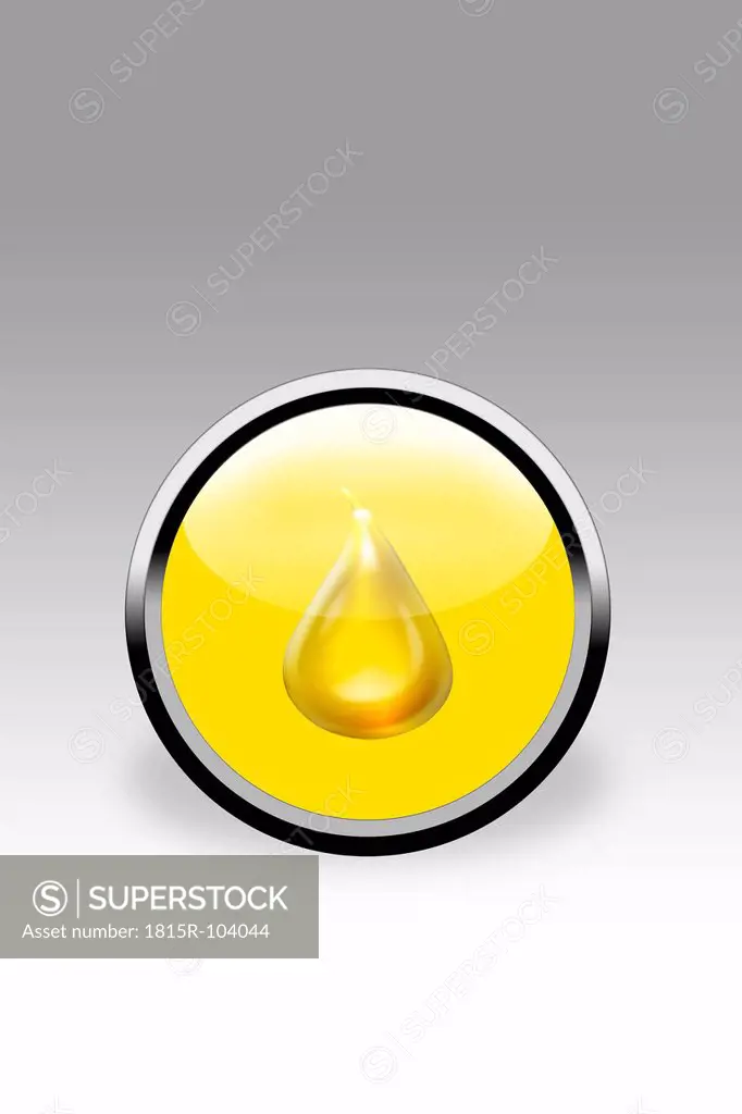 Yellow button showing drop of oil, close up
