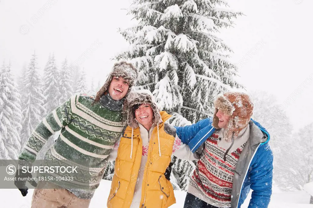 Austria, Salzburg, Men and woman in winter, smiling