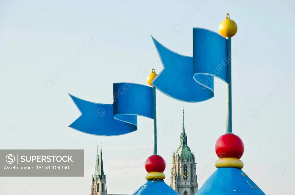 Germany, Bavaria, Munich, View of tent in Oktoberfest, St Paul cathedral in background