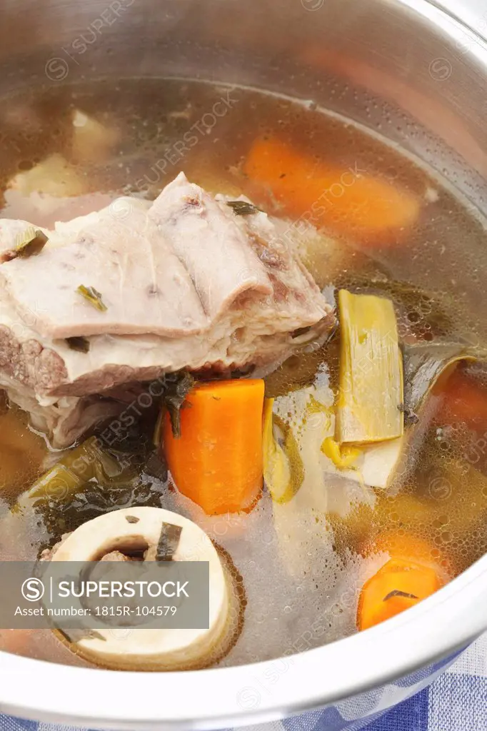 Beef broth in stew pot, close up