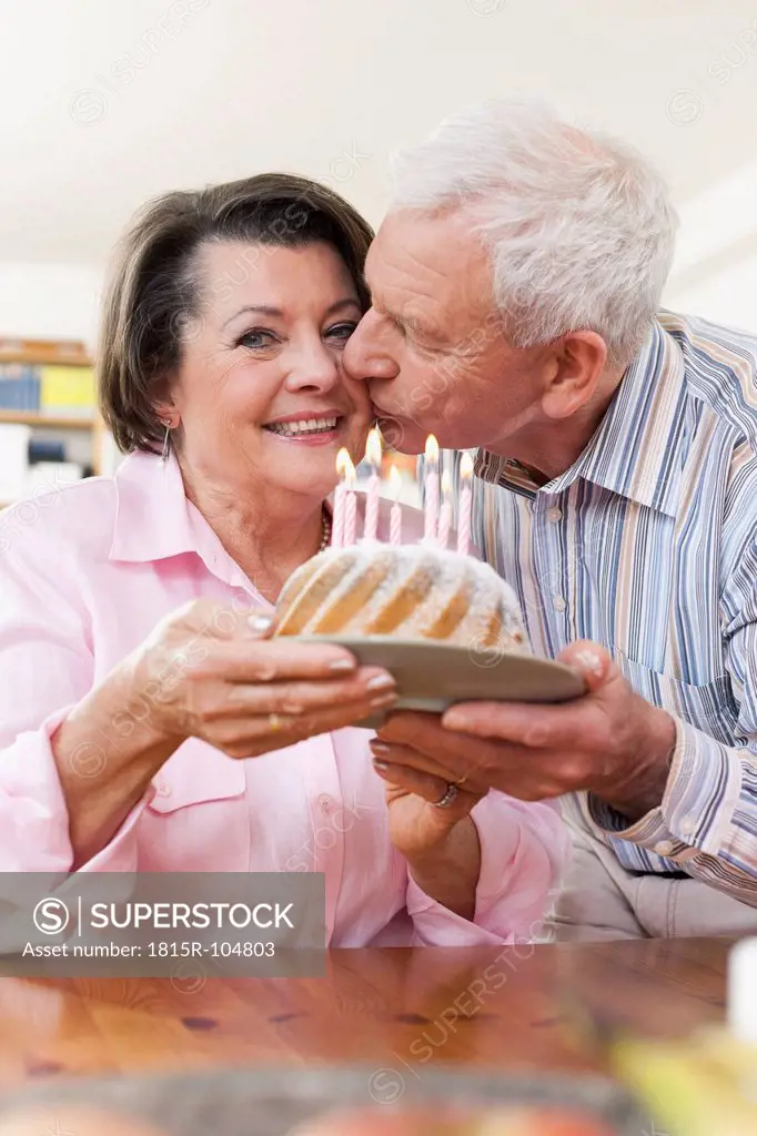 Germany, Leipzig, Senior man and woman celebrating birthday