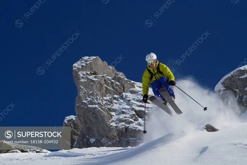 Austria, Arlberg, Warth, Mid adult man skiing