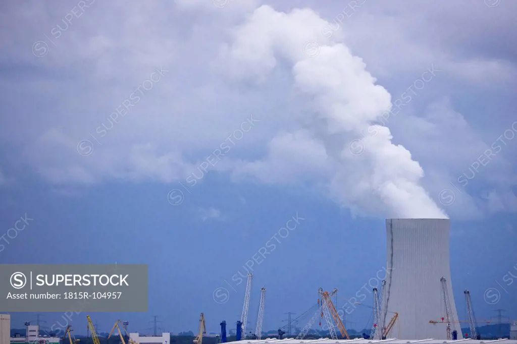 Germany, Rostock, Smoke coming from chimney