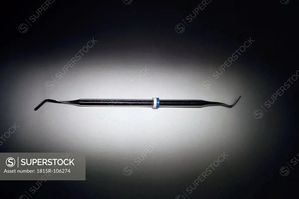 Dental spatula on white background