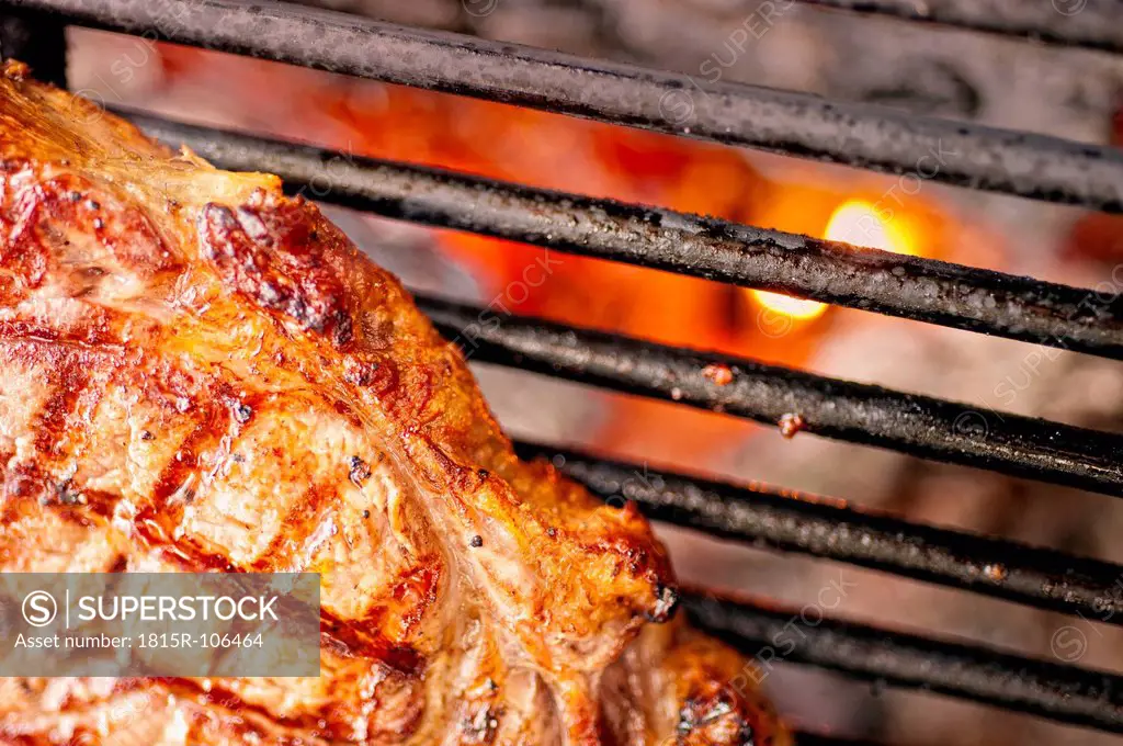 USA, Texas, Rib eye steak on barbecue grill