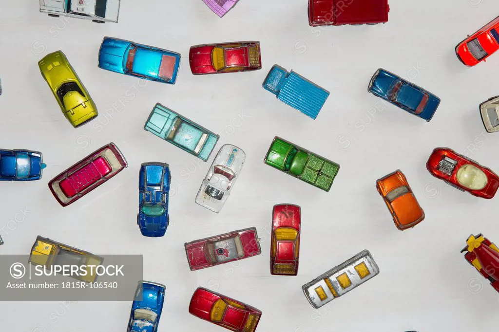 Collection of toy cars on white background