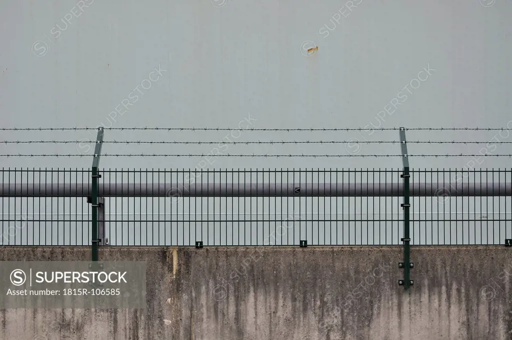 Germany, Bavaria, Wall with barb wire