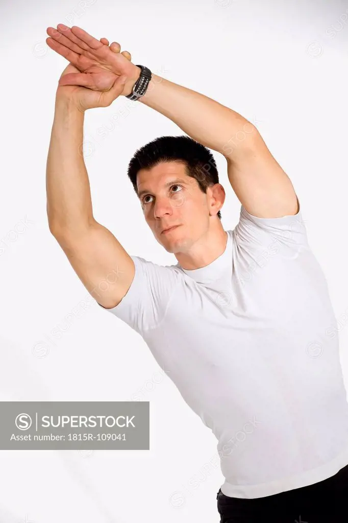 Personal trainer stretching hands against white background, close up