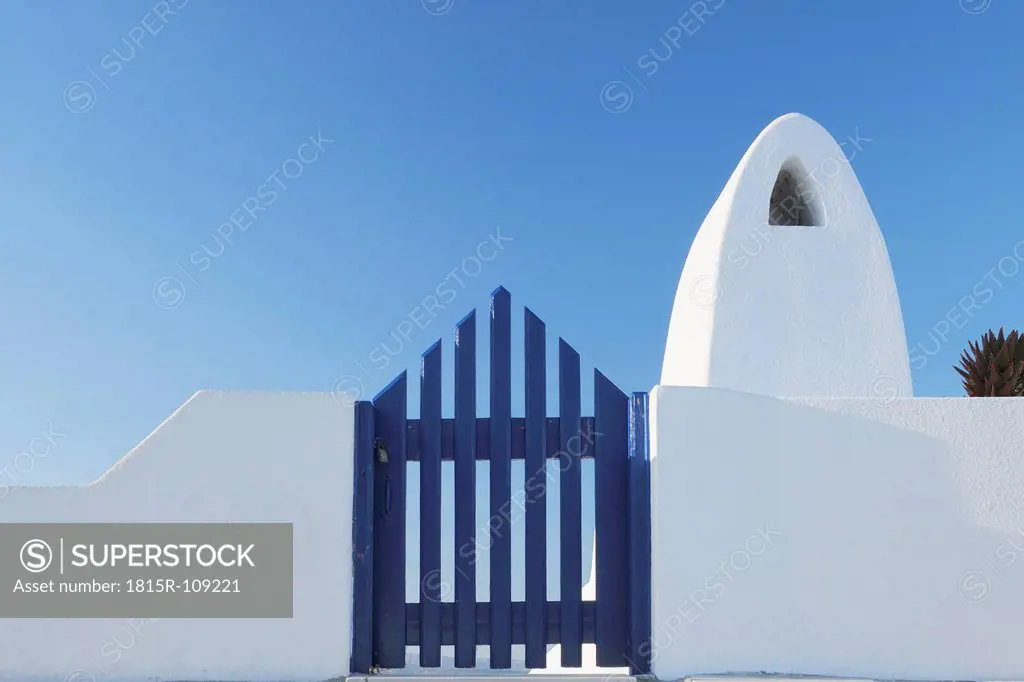 Greece, Traditionally Greek gate and chimney in oia village at Santorini