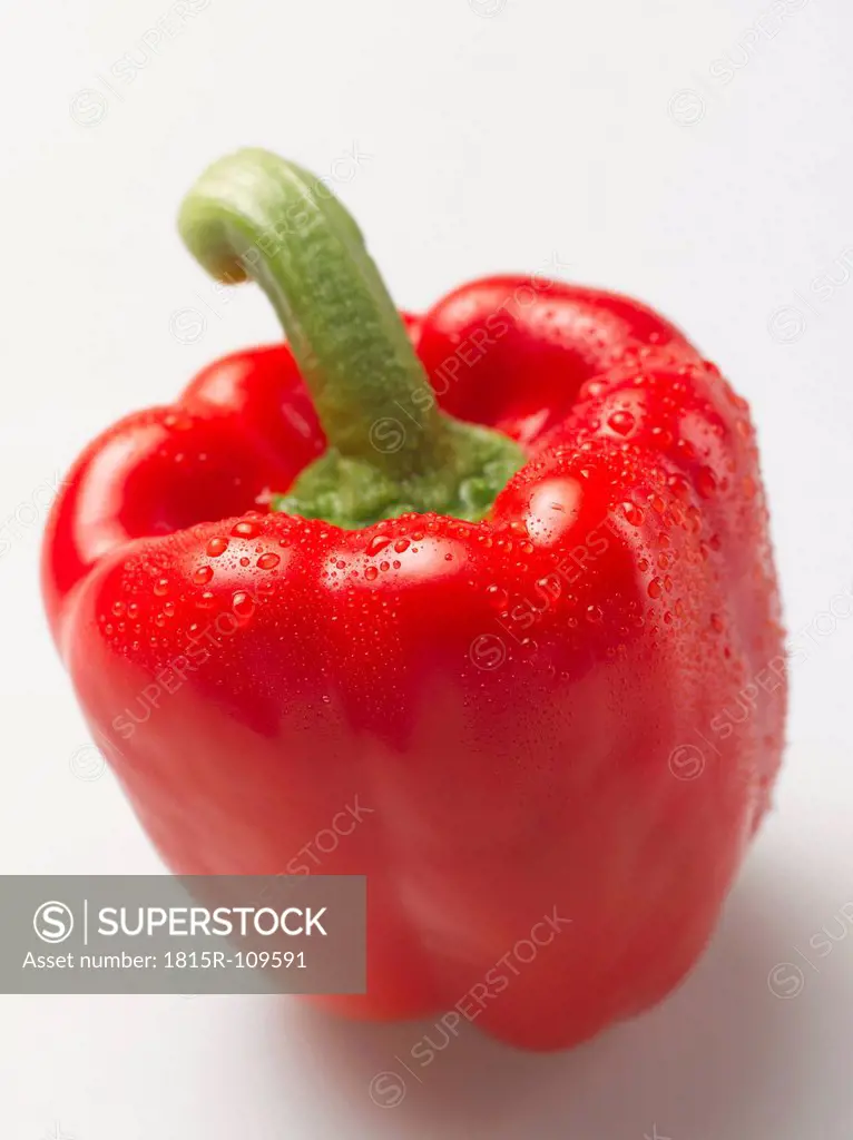 Red bell pepper on white background, close up