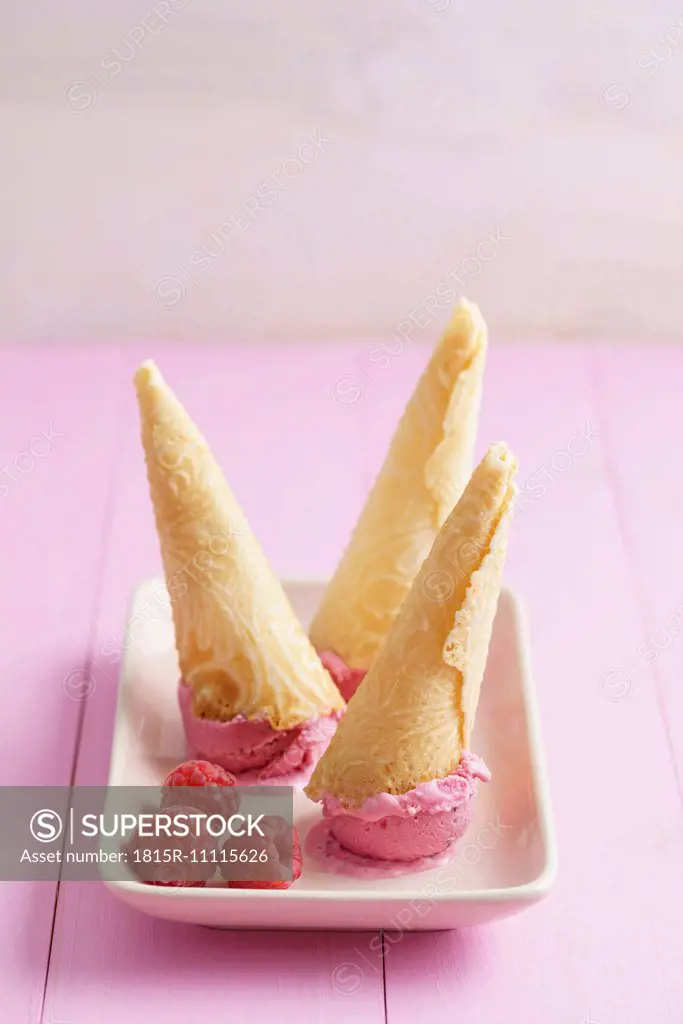 Raspberry icecream in homemade ice cream cones