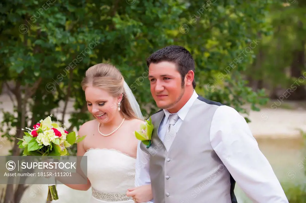 USA, Texas, Bride and groom smiling, close up