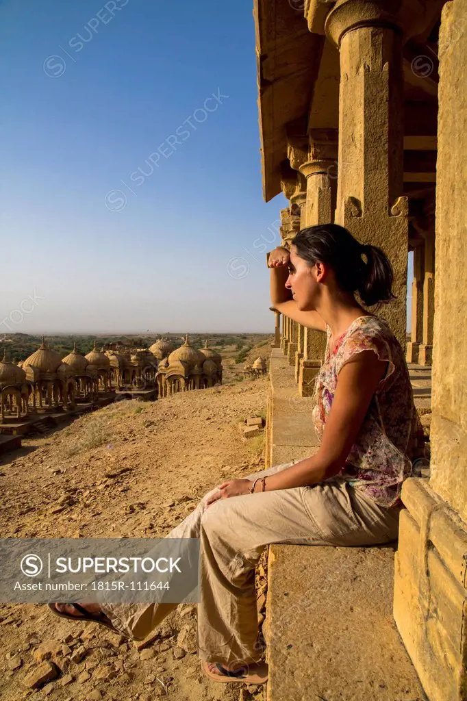 India, Rajasthan, Jaisalmer, Tourist at Bada Bagh Cenotaphs