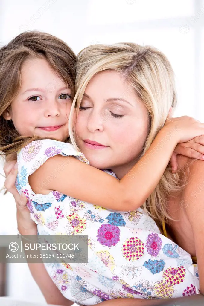 Germany, Mother and daughter embracing
