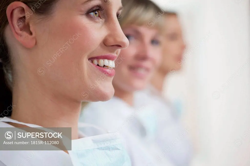 Germany, Dentist and assistance, smiling
